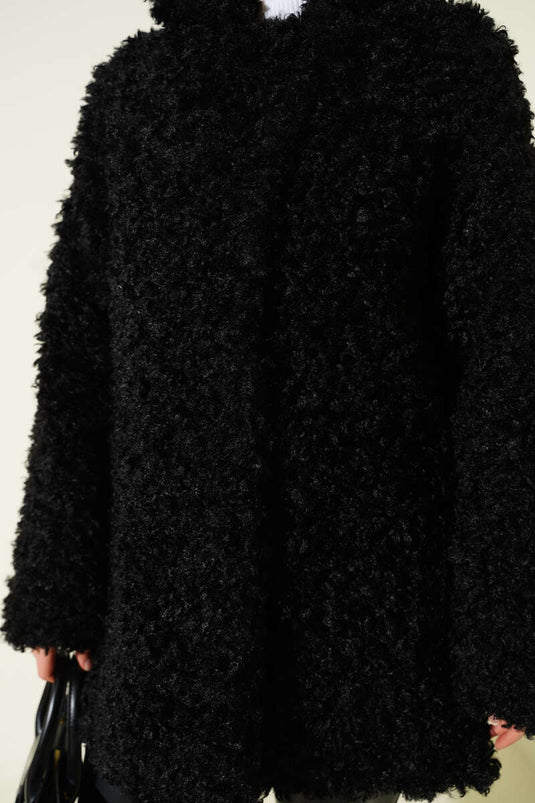 Double-breasted lambskin coat, black.