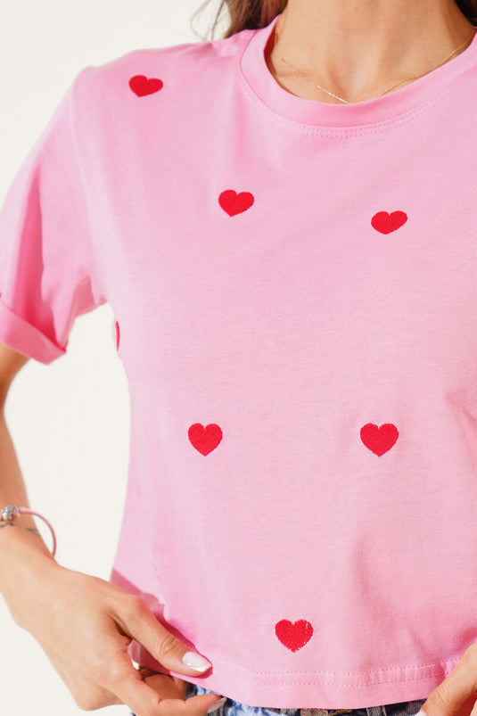 Top corto rosa con pequeño bordado de corazón