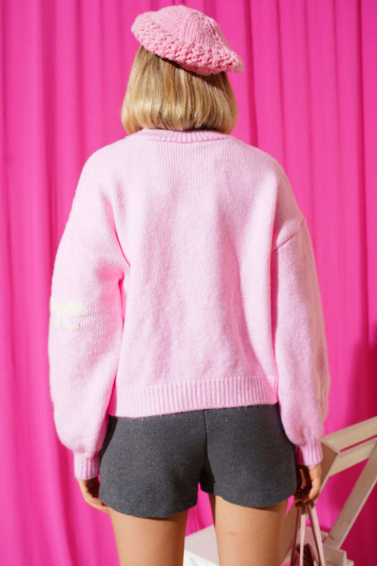 Maglione lavorato a maglia con ricamo a nastro rosa