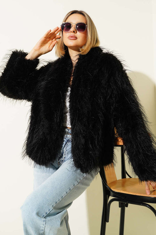 معطف فضفاض بتفاصيل من الفرو، أسود اللون.
