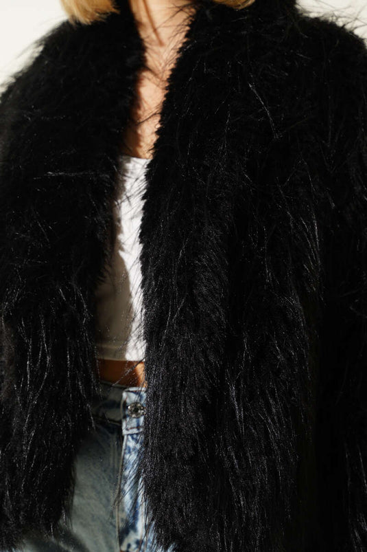 Losvallende jas met bontdetails, zwart.