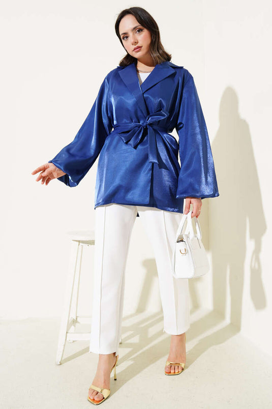 Veste brillante bleu marine à manches ballon et ceinture