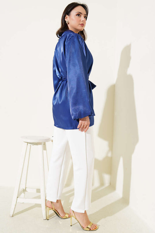 Veste brillante bleu marine à manches ballon et ceinture