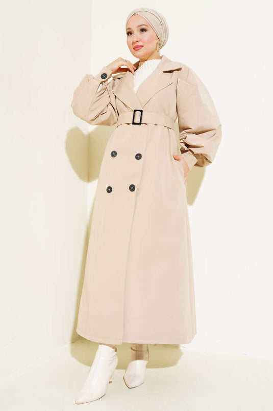 Langer Trenchcoat mit Gürtel und Ballonärmeln in Beige