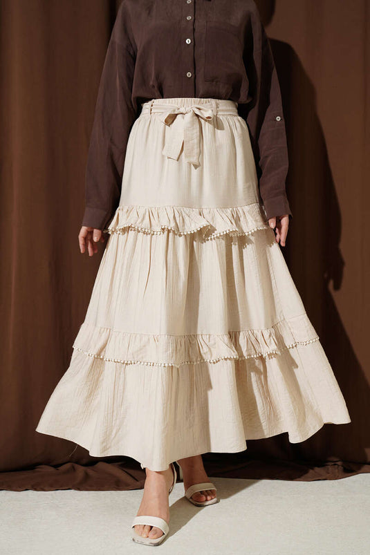 Jupe évasée à volants avec ceinture beige