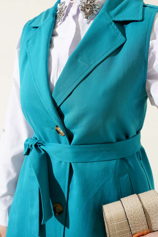 Trench-coat à manches zéro avec ceinture vert pétrole