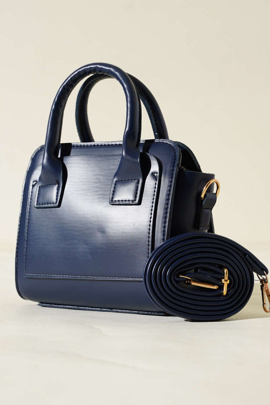 حقيبة يد موديل كوتو باللون الأزرق الداكن