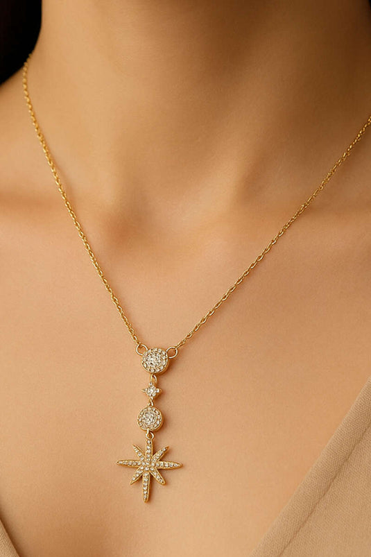 Gouden halsketting met Poolster en stenen