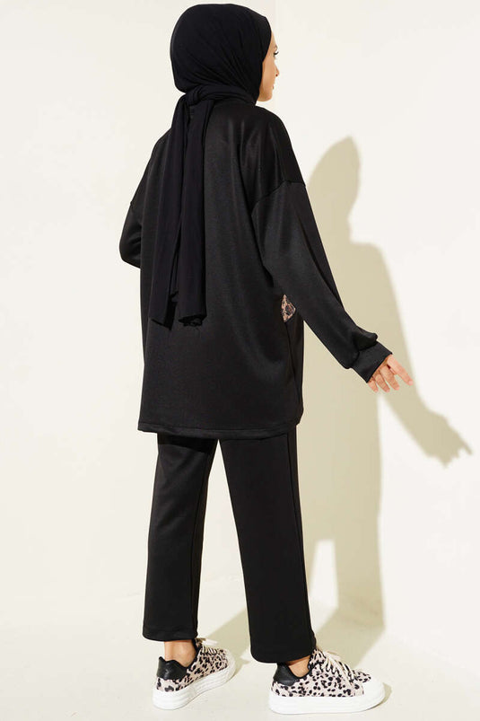 بدلة مزدوجة مطرزة بطبعة الفهد باللون الأسود