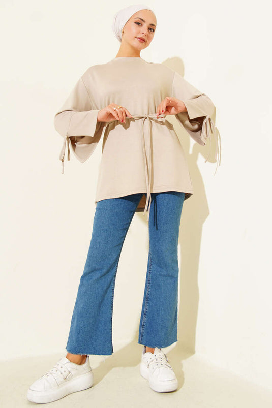 Tunique Loysha nouée au poignet avec corde en pierre