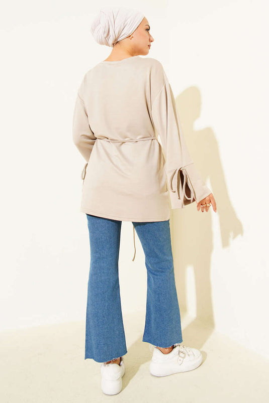 Tunique Loysha nouée au poignet avec corde en pierre