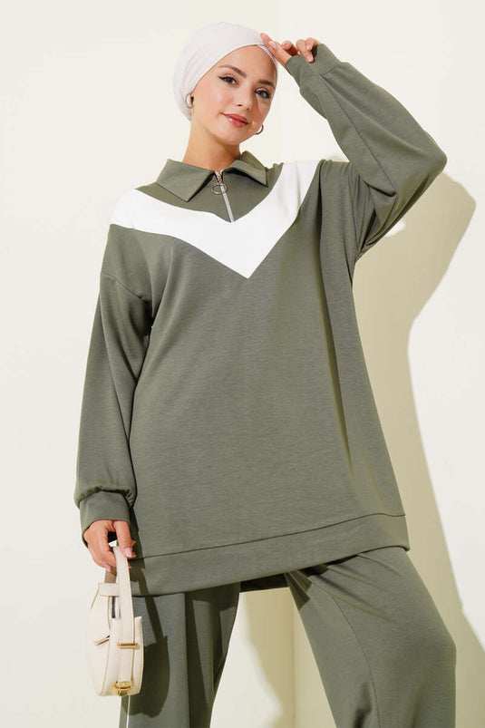 Loyşa tweedelig pak met rits en V-streep, amandelgroen