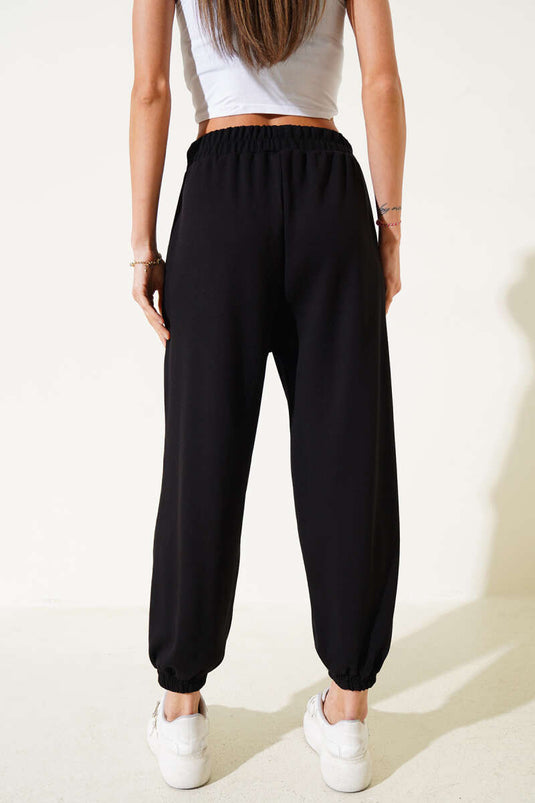 Pantalon de jogging Loyşa noir avec ceinture avant détaillée