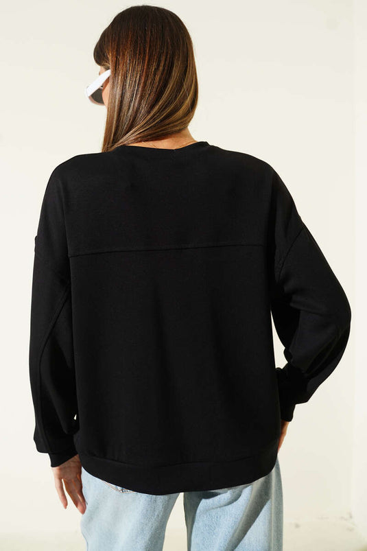 سويت شيرت لويشا أسود فضفاض