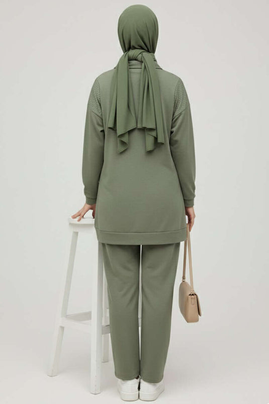 بدلة لويزا ستوند بسحاب من قطعتين، لون أخضر لوزي
