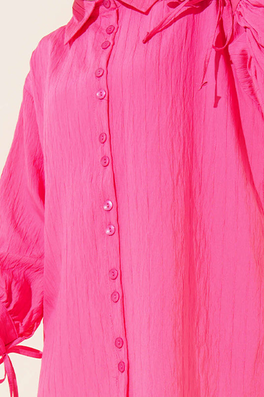 Tunique en dentelle à revers fuchsia