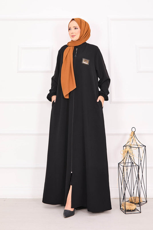 Abaya hijab noire à poches et poignets élastiques