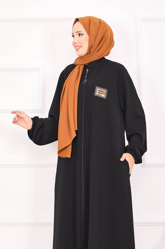 Abaya hijab noire à poches et poignets élastiques