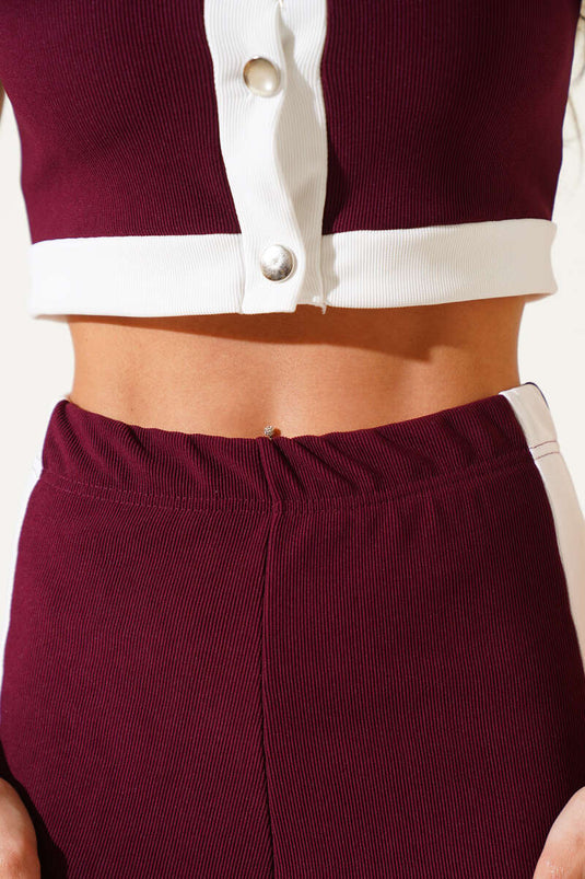 Ensemble deux pièces bordeaux : débardeur court à manches courtes et boutons métalliques