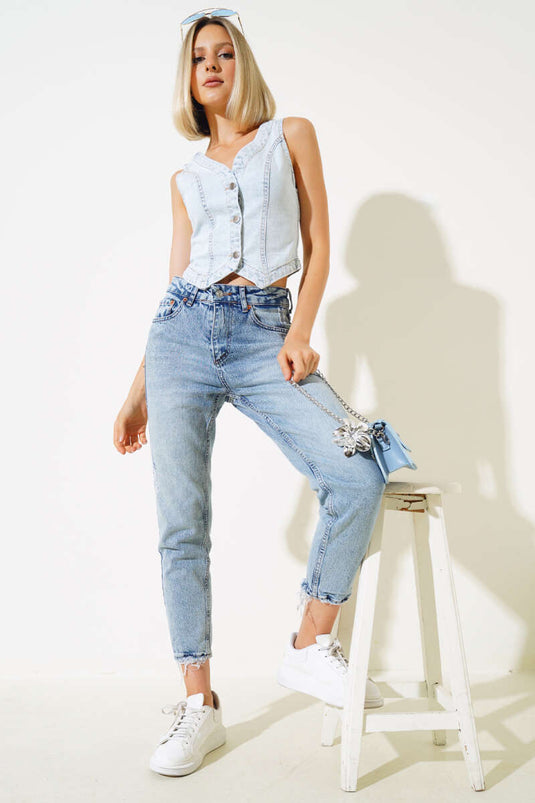 Gilet en jean bleu glacier à boutons métalliques