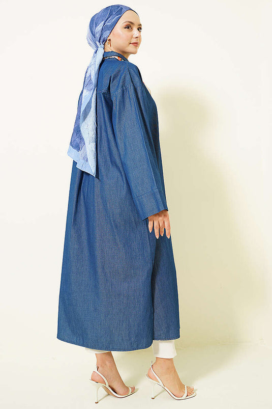 Tunica lunga in denim con bottoni metallici e taglio ampio