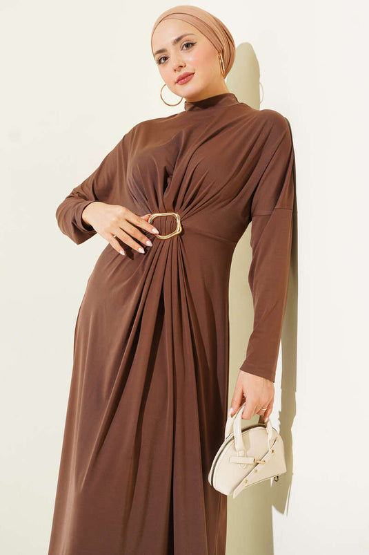 Coffee-colored ruched dress with metal buckle.