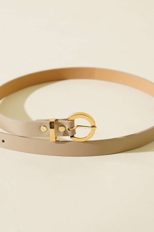 Ceinture fine beige à boucle ronde en métal