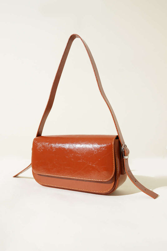 Sac magnétique en cuir beige