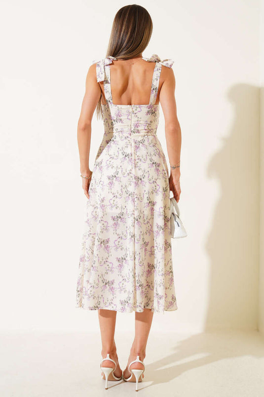 فستان ميدي قصير مزين بالورود مع ربطة كتف، لون أصفر