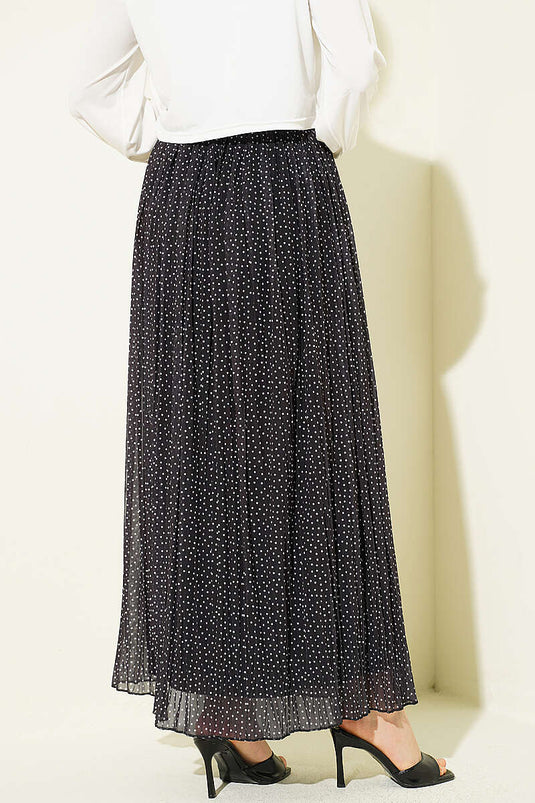 Mini jupe plissée à ceinture à pois noirs