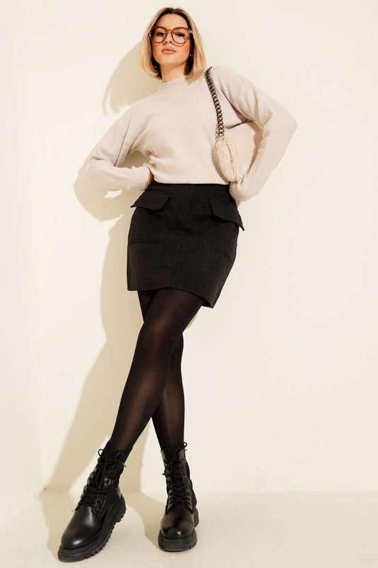 سترة صغيرة لامعة محبوكة