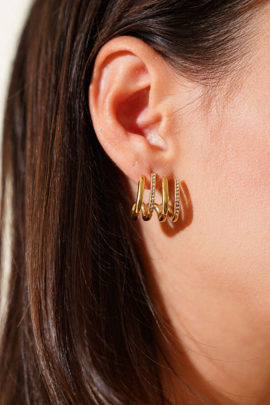 Boucles d'oreilles rayées ornées de mini-pierres