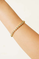 Bracelet en or avec mini pierres en forme d'étoile
