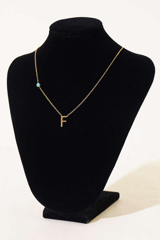 Collier de lettres perlées mauvais œil F