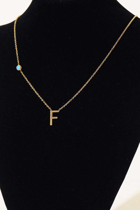 Collier de lettres perlées mauvais œil F