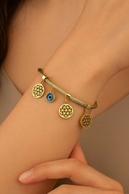 سوار مغناطيسي ذهبي مع خرزة عين الحسد