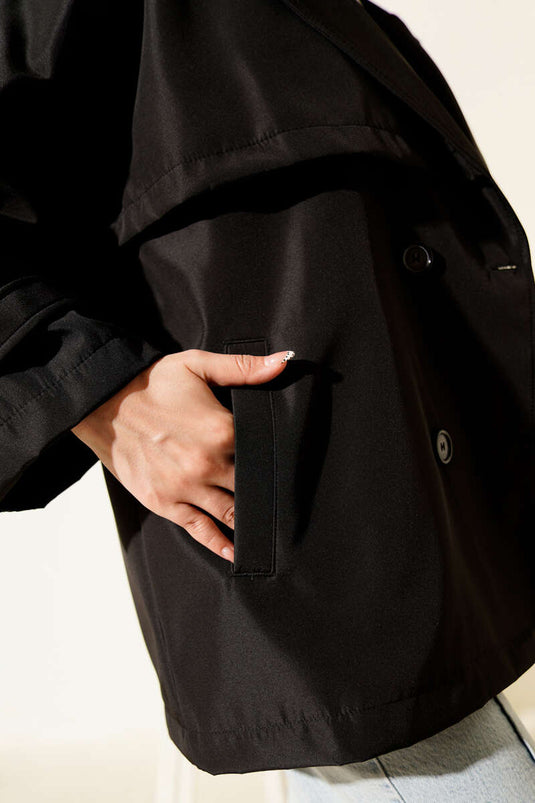 Trenchcoat met ceintuur en schouderepauletten, zwart