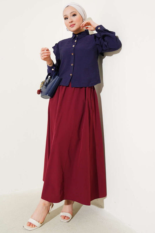 Chemise courte avec volants aux épaules bleu marine