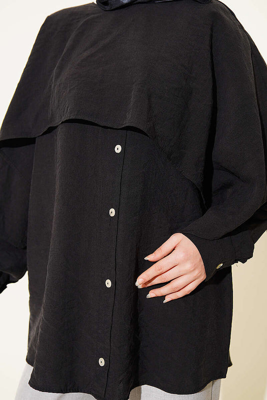 Tunique noire avec cape épaule et détails boutons