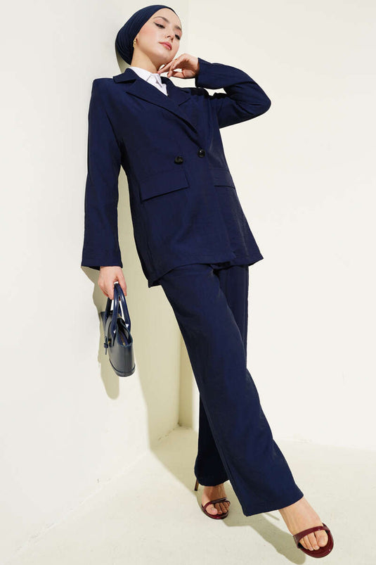 Navy Blue Three-Piece Set with Shoulder Pads, Jacket, and Vest