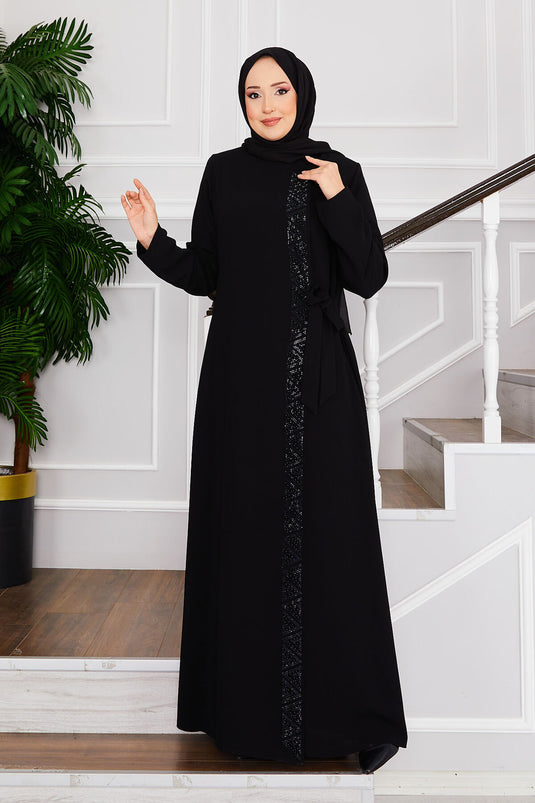 Hijab Abaya noir avec détails en pierre et boutons sur l'épaule