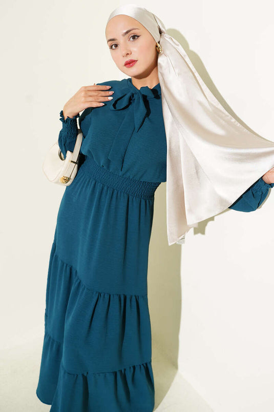 Jurk met strikdetail aan de voorkant en elastische tailleband, petrolgroen