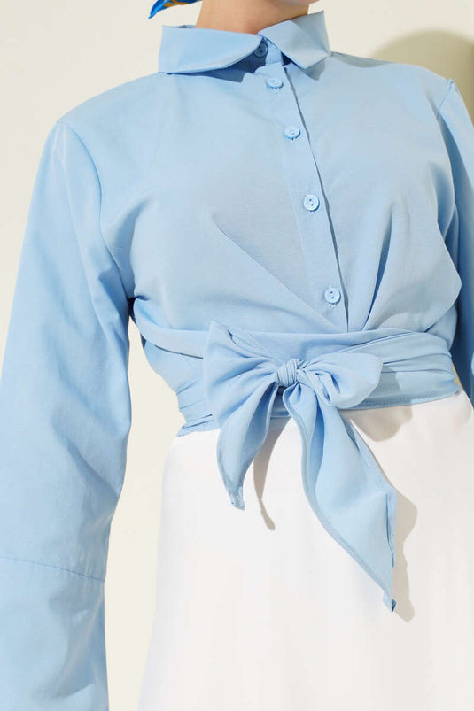 Chemise courte nouée devant bleue