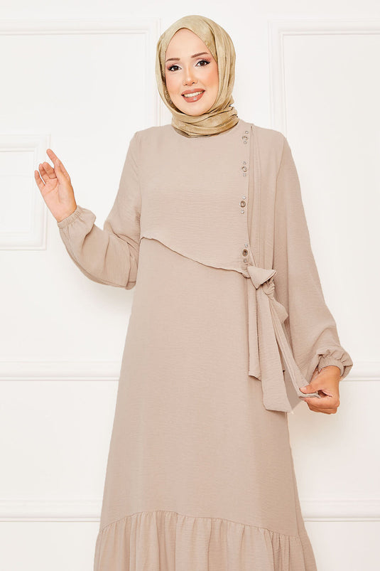 Beige kanten jurk met voor- en stenen detail