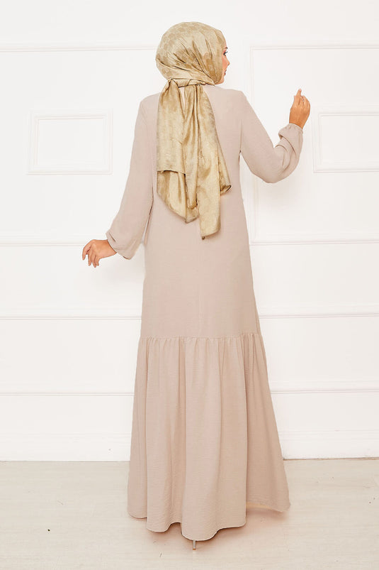 Beige kanten jurk met voor- en stenen detail