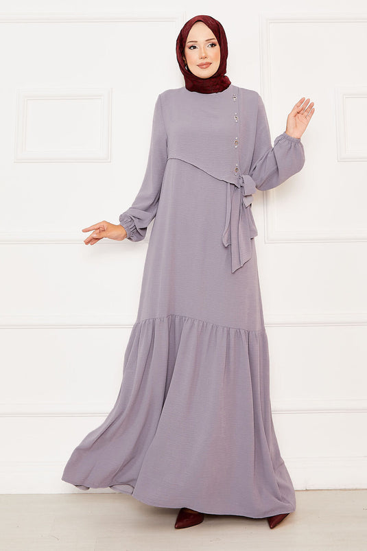 Graues Kleid zum Binden mit Aller- und Steindetail auf der Vorderseite