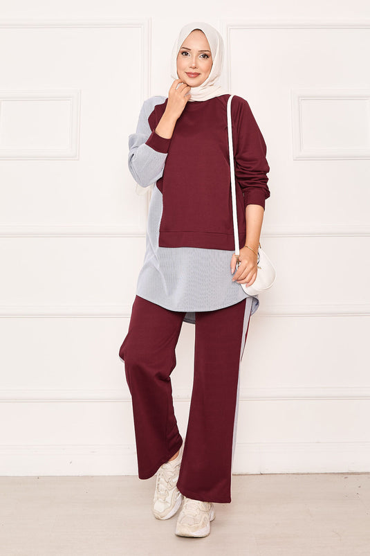 بدلة مخططة من قطعتين غير متماثلتين باللون العنابي