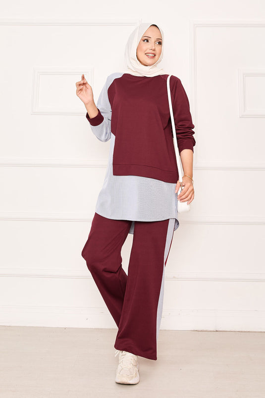 بدلة مخططة من قطعتين غير متماثلتين باللون العنابي