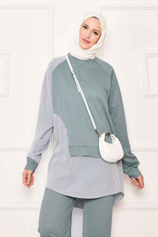 طقم من قطعتين بلون النعناع مع زخارف مخططة غير متماثلة على الجهة الأمامية