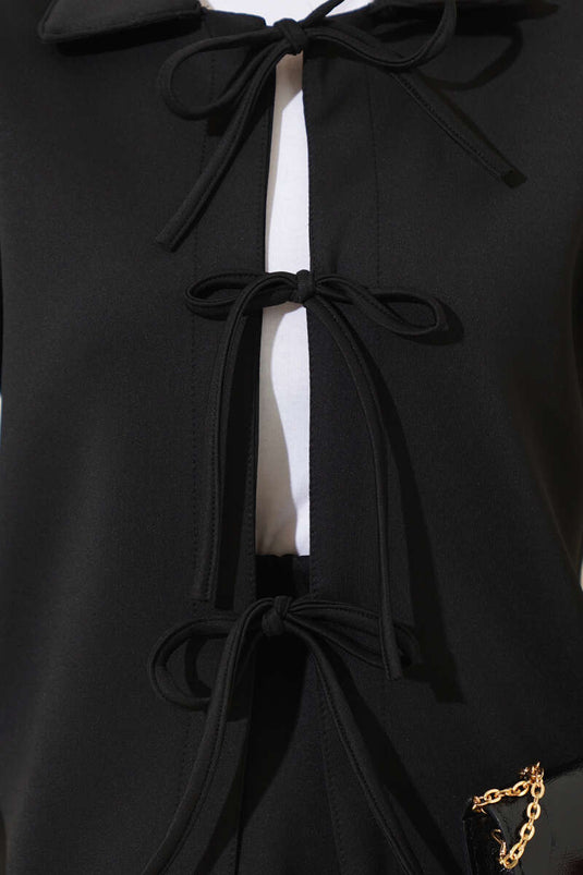 Costume double en néoprène avec veste et jupe en dentelle sur le devant Noir